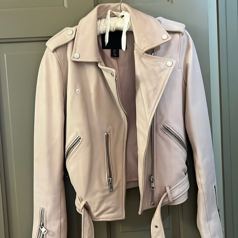 Pink leather jacket, size small.